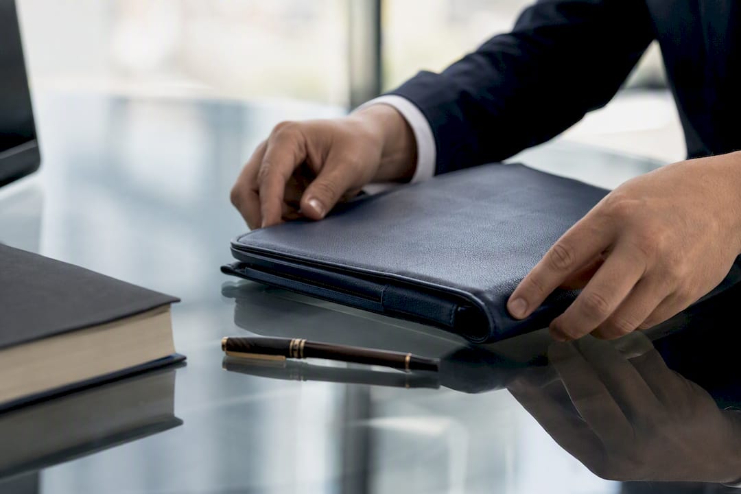 Solicitor’s hand adjusting legal portfolio